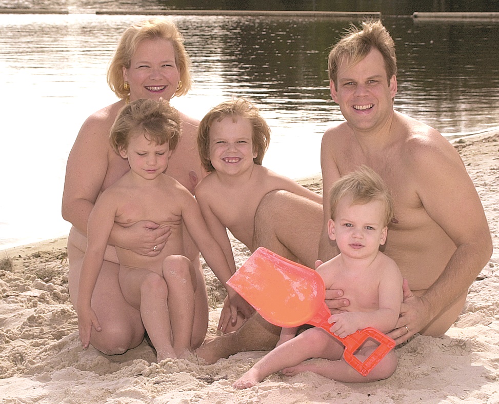 Nudist Family enjoy a beach day